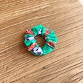 Green fabric scrunchie with blue and white soccer ball patterns on wood background - Green Soccer (21#)