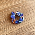 Blue fabric scrunchie with football print and Goal text on a wooden surface - Goal Soccer (23#)