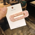 Handmade rectangle hair clip featuring pink marble pattern on white cardboard backing - Rectangle / Pink