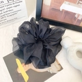 Oversized black organza scrunchie with layered pleated texture for voluminous hair styles - Black