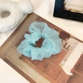 Light blue organza scrunchie with sheer mesh pleats on vintage art print background - Sky Blue