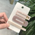Set di tre fermagli per capelli rosa in acrilico con texture marmorizzate e glitterate - Set di Fermagli per Capelli Marmo Rosa