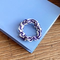 Blue and white striped fabric scrunchie with pleated texture on a blue book - Small Size / Navy Blue