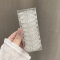 Lot de 9 élastiques à cheveux en spirale transparents dans une boîte de rangement épurée - Transparent