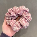 Pink and white houndstooth fabric scrunchie with soft knitted texture for women - Pink