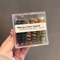 Set of 6 spiral telephone wire hair bands in earth tones inside a clear storage box - Black Brown and Military Green Style