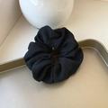 Oversized black organza scrunchie displayed on a minimalist gold metallic tray - Small / Black