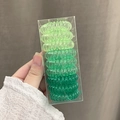 Set of 9 gradient green spiral telephone wire hair ties in a transparent box - Green