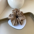 Oversized khaki organza scrunchie with matte texture on a golden tray - Small / Coffee