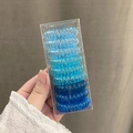 Lot de 9 chouchous spirales bleu dégradé dans une boîte de rangement claire - Bleu