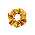 Close-up of golden satin fabric scrunchie showing smooth texture and elastic design - Gold