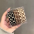 Three-pack of braided elastic hair ties in black, brown, and beige tones in a clear box - Ribbed Two-Tone (6#)