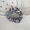 Elegant silver grey satin scrunchie hair tie with glossy silk texture for women - Gray
