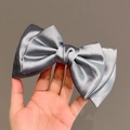 Elegant large grey satin bow hair clip with a luxurious silky finish for women - Grey Marble