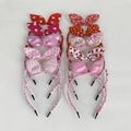 Flat lay of ten bunny ear headbands with colorful floral and polka dot fabric patterns - Style 5 (10-Piece Set)