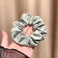 French style sage green satin scrunchie with elegant pleated fabric texture - Macaron Green