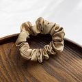 Elegant champagne gold satin scrunchie with a silky finish and pleated design for women - Earth Tone
