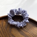Elegant lavender silk satin scrunchie with soft ruched texture for daily hairstyling - Lavender