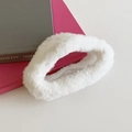 White fluffy faux fur plush hair claw clip in a wide cloud-like design for women - White