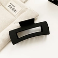 Pinza per capelli rettangolare nero opaco con design traforato su tela beige - Nero
