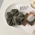 Olive green knitted scrunchie with vertical ribbed texture for women hair styling - Green Striped
