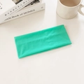 Bright green elastic cotton sports headband for yoga and fitness with soft knit texture - Cyan