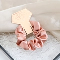 Rose gold satin scrunchie with diamond shaped card on a wavy display tray - Gold Pink