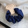 Dark blue satin scrunchie with metallic luster on elegant geometric display card - Dark Blue