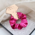 Vibrant rose pink satin scrunchie displayed on a gold diamond-shaped card holder - Rose Red