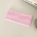 Pink elastic knitted headband for women in soft Morandi pink with fine vertical texture - Pink