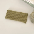 Olive green elastic knitted headband with ribbed texture in a solid morandi color - Green