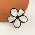 Floral hair claw clip with black and white petals for elegant back-of-head styling - White Black Edge