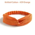 Tangerine orange knitted cotton twisted headband with ribbed texture and elastic band - Orange