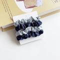 Elegant 4-piece satin scrunchies set in navy and light blue colors on display card - Dark Blue Light Blue Splicing