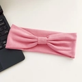 Pink elastic yoga headband with bow knot, soft knitted fabric for women sports hair accessory - Pink