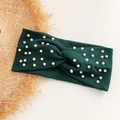 Dark green knitted twist headband with pearl accents and ribbed elastic texture - Dark Green