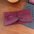 Sparkly burgundy rhinestone headband with a stylish knotted design and ribbed knit fabric - Red