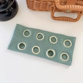 Green ribbed knit headband featuring eight silver metal eyelets in a punk fashion style - Haze Green