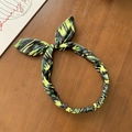 Retro plaid knotted headband with bunny ear design in neon yellow and dark green camouflage - Green Graffiti