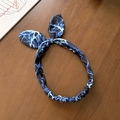 Knot headband with black and blue lightning pattern and rabbit ear tie design - Blue Rendering