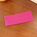 Bright pink ribbed knit elastic headband for yoga and sports on a wooden background - Rose Pink