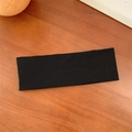 Elastic black ribbed knit yoga headband with wide rectangular design on wood background - Black
