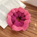 Knitted pink and purple color-block scrunchie on a wooden desk with a vintage book - Rose Pink and Pink