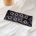 Black paisley print wide headband with silver metal eyelets and classic boho pattern - Black Floral