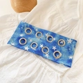 Blue tie-dye headband with white stars and silver metal grommets for hair styling - Light Blue Iridescent