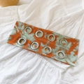Fashionable tie-dye wide headband with orange and green patterns and metal eyelets - Filtered Tie-dye