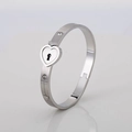 Zilveren roestvrijstalen hartslot armband met zirkoon accenten en geborstelde finish - Staalkleur