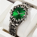Gothic style silver watch featuring a vibrant green dial and unique claw engravings - Green