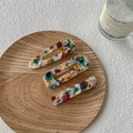 Lot de trois barrettes en acétate avec motifs terrazzo colorés et base en métal doré - Écaille de tortue