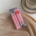 Detailansicht von zwei rosa Lockenwicklern für Volumen in Klarsichtverpackung - Rosa